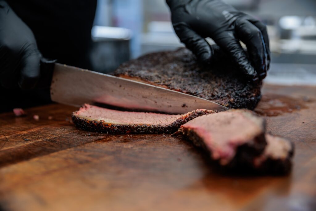 brisket cooked over a fire