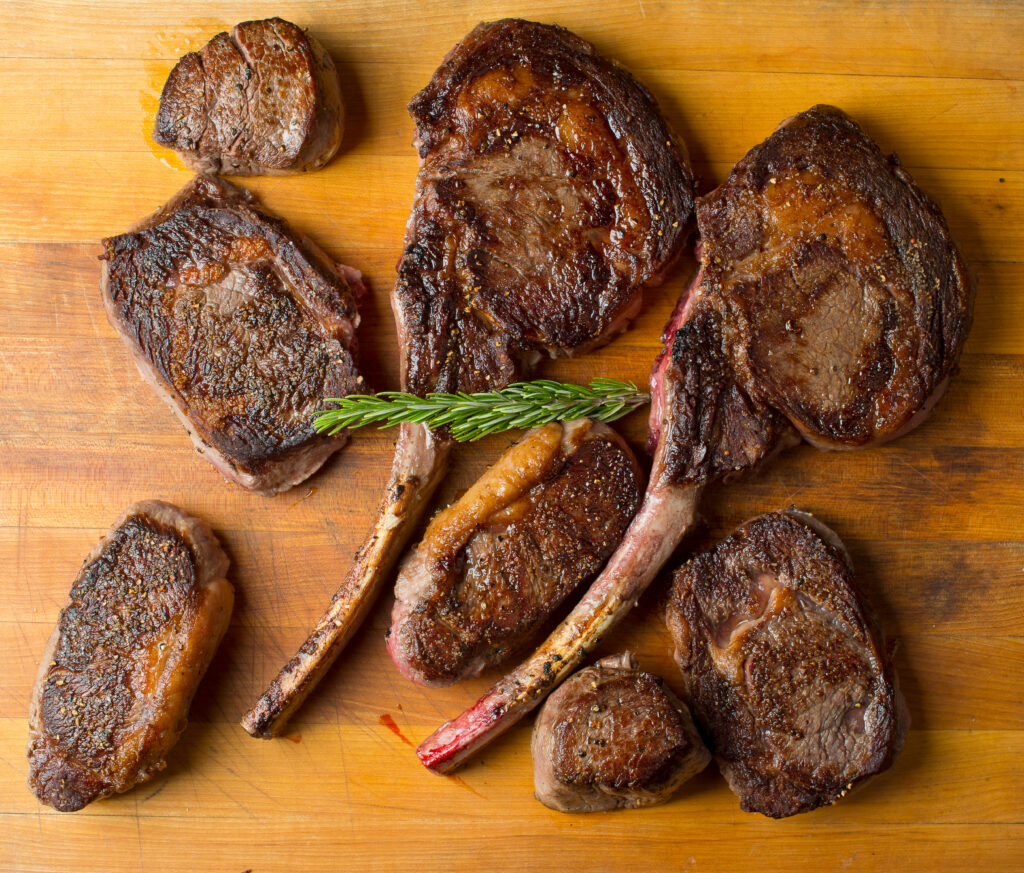 variety of pieces of steaks and meats