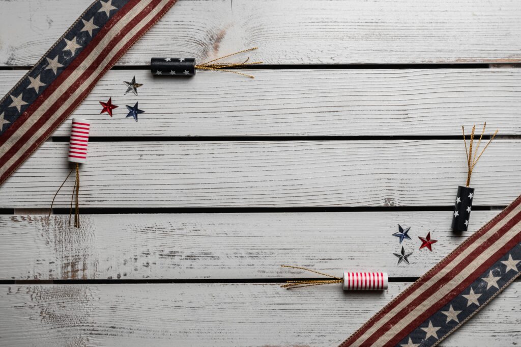 white wooden planks with American flag decorations for the 4th of July